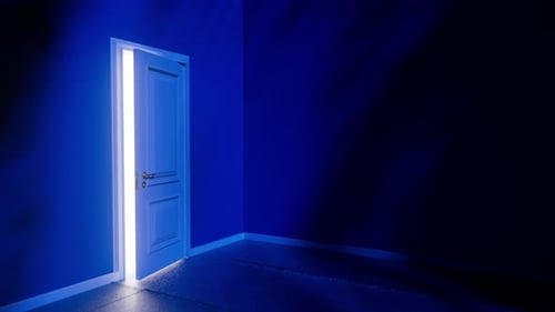 White door opening on a bright light in a dark room