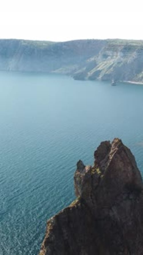 Aerial Vertical View of Seascape with Crystal Clear Azure Sea and Rocky Shores A Beautiful Lagoon on