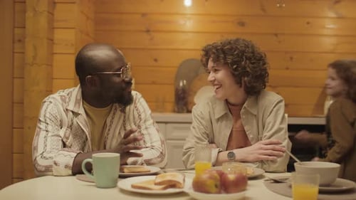 Loving Family Breakfast Time at Cabin Kitchen Table