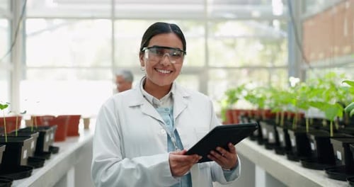 Tablet, portrait and science with a woman in a greenhouse to study plant growth for ecology