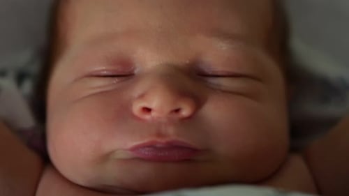 Newborn Baby Sleeping Peacefully a Montage of Sweetness