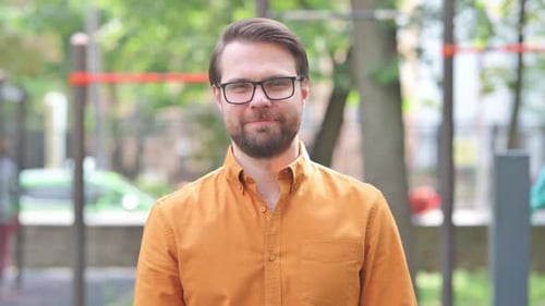 Adult Male Giving Thumbs Up Outside