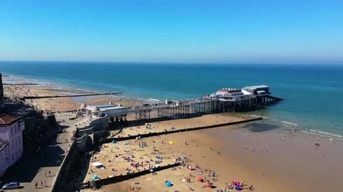 Cromer Pier, Cromer, Norfolk, United Kingdom. View from south beach of the pier and theatre.
