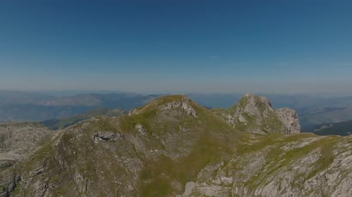 Drone view of the Zla Kolata mountain peak with surrounding mountains in summer on the Montenegro Al