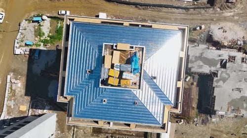 Building Dreams Aerial View of a Residential Construction Site in the Making