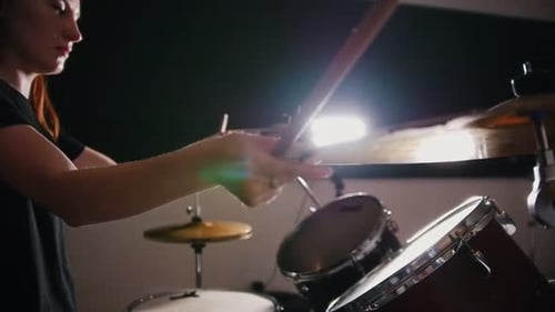 Dashing Girl with Black Hair Percussion Drummer Starts Playing Drums