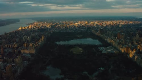 Golden hour aerial view of central park and manhattan skyline in New York City