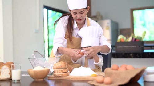 Professional pastry chef asian mom and son making bakery bread cake prepare delicious sweet food