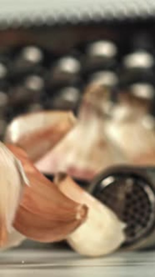 Fresh Garlic Falls on the Table Filmed on a Highspeed Camera at 1000 Fps