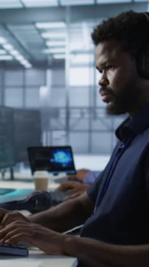 Vertical Video Engineer Using Audio Device to Hear Podcasts in Data Center