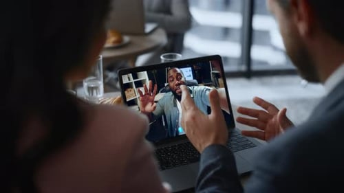 Happy Colleagues Talking Laptop Video Call in Cafeteria Closeup Team Conference