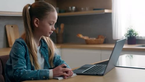 Home Schooling Quarantine Elearning at Home Kitchen Concept Caucasian Kid Child School Girl Daughter