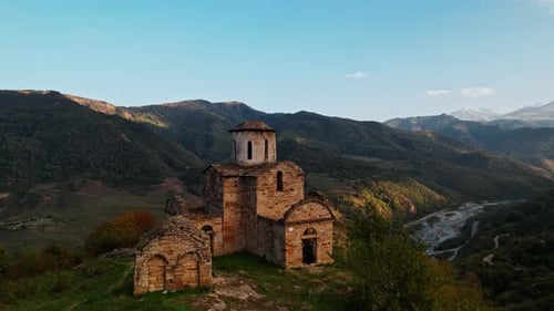 Ancient Stone Castle At Top Of Mountain Aerial View Picturesque Landscape With Historical Landmark