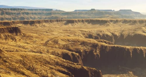Stunning Landscape View of Rugged Canyons During Golden Hour in a Remote Area