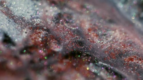 Glitter Dust Swirling in a Macro Close Up