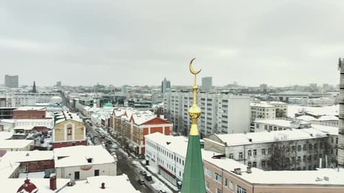 Snowy Mosque Against Residential District in City Centre