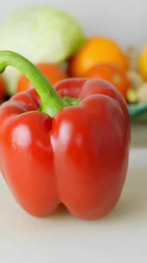 Vertical close up of red pepper, healthy eating, vegetables, vegetarians, circle shot around object