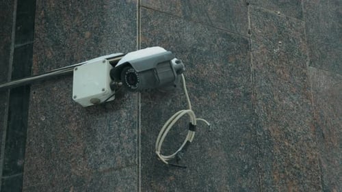 Urban Watch Security Camera Mounted on a Building