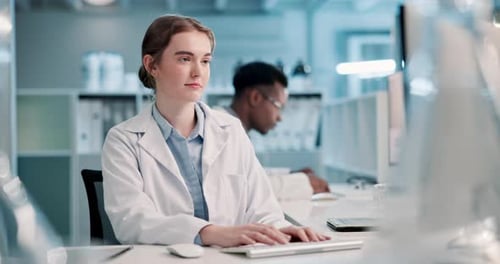 Scientists Working in Modern Research Laboratory