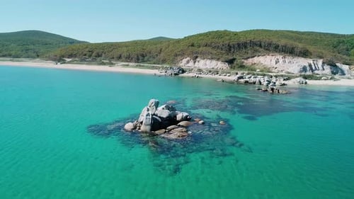 Aerial View of a Beach Turquoise Water and Huge Rocks in the Sea Beautiful Seascape