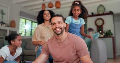 Happy Family Smiling Together in Living Room