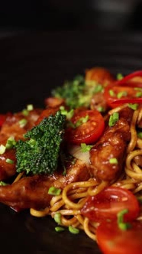 Close Up of Appetizing Stir Fried Noodles with Chicken
