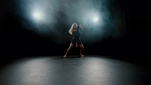 Contemporary Dance Performance Blonde Woman Dancing in Darkness Slow Motion Beautiful Slender Woman