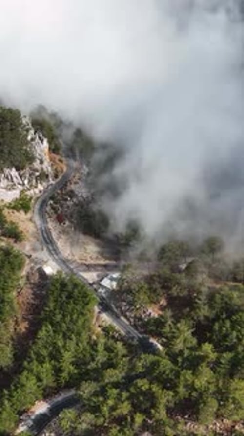 Vertical Video Cloudy Landscape in the Mountains Aerial View
