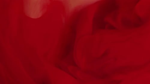 Abstract Red Ink Swirl Background