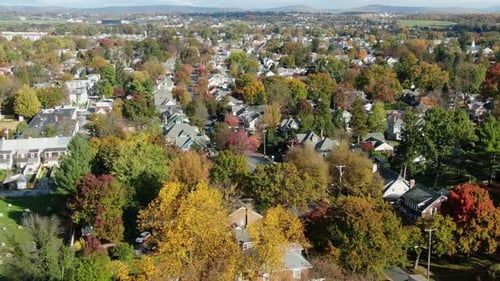 Suburban town in Northeast USA. Aerial overhead view of city in United States, community of homes.