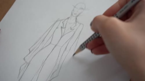 Hand Drawing Fashion Sketch on Paper