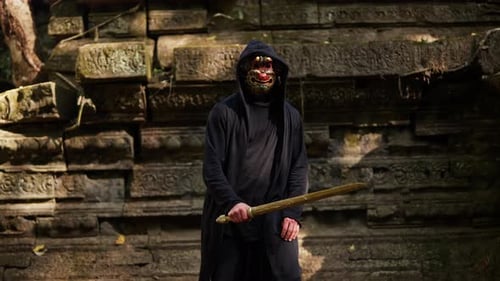 Mysterious Masked Figure Practicing Sword Techniques Outdoors