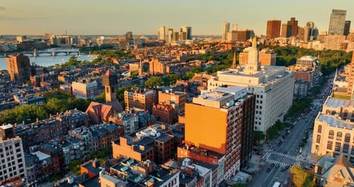 Lovely architecture of Boston at golden hour. Bright scenery of the USA city from top view.