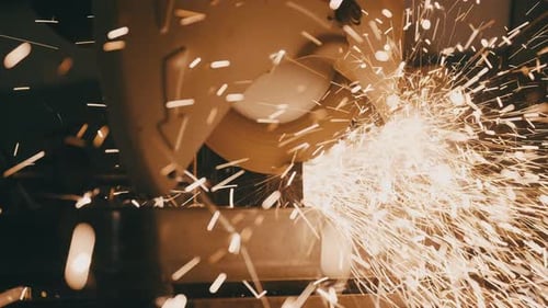 Cutting Metal Sparks Flying with Power Tool