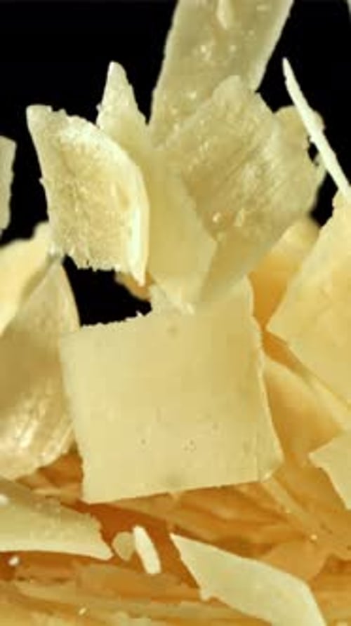 Parmesan Cheese Flies Up and Falls Down Filmed on a Highspeed Camera at 1000 Fps