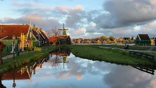 Picturesque Netherlands Landscape with Windmill at Sunrise