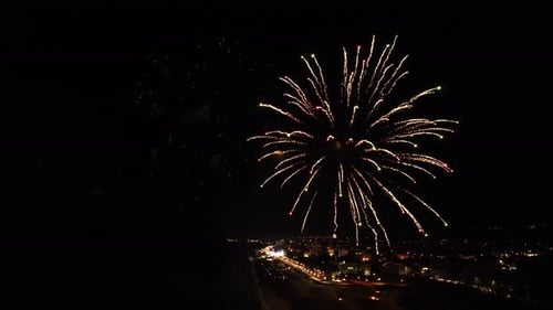 Aerial City Coastline Fireworks Display at Night
