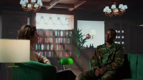 Soldier Talking with Therapist in Office Environment