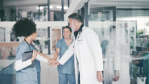 Doctor, meeting and hands together for collaboration, motivation or unity in teamwork at hospital