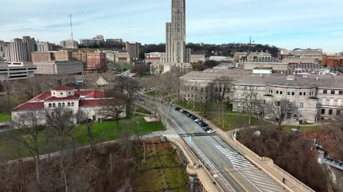 Rising aerial of University of Pittsburgh. Pitt Cathedral of Learning.