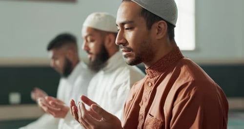 Islamic, praying and men in a Mosque for spiritual religion together as a group to worship Allah