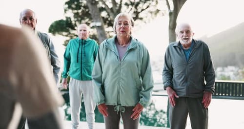 Exercise, mobility and personal trainer with senior yoga class outdoor in city for fitness