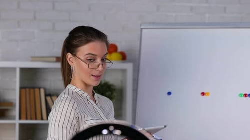Woman Creating Educational Video in Home Studio