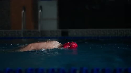 Professional Female Swimmer Swimming Butterfly Style In Pool Slow Motion Shot Championship