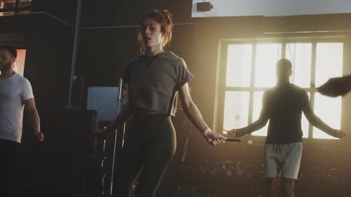 People skipping rope at gym