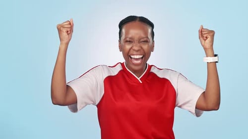 Celebration, happy and face of woman athlete in a studio for match, game or tournament win
