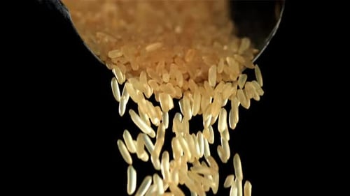 Rice Falls From the Scoop Filmed on a Highspeed Camera at 1000 Fps