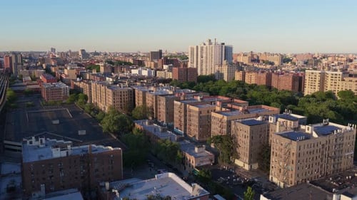 Morning Light Illuminating Urban Apartment Buildings in South Bronx New York City Featuring