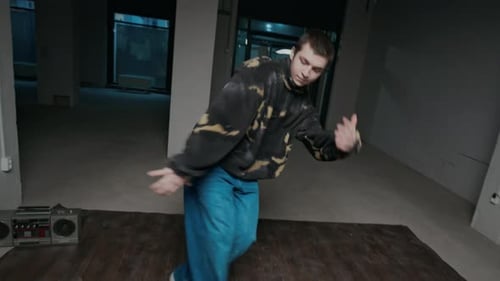 Young Adult Dancing in an Urban Setting