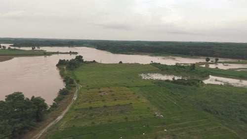 Aerial View Of Flooded Landscape With River
